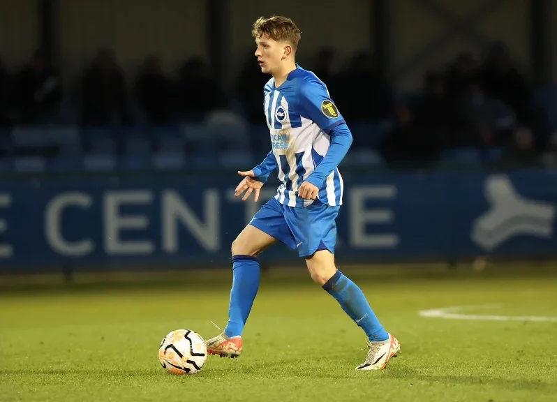 Harry Lee in possession of the football